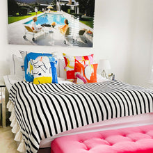 Load image into Gallery viewer, Colourful printed cushions in a modern home.
